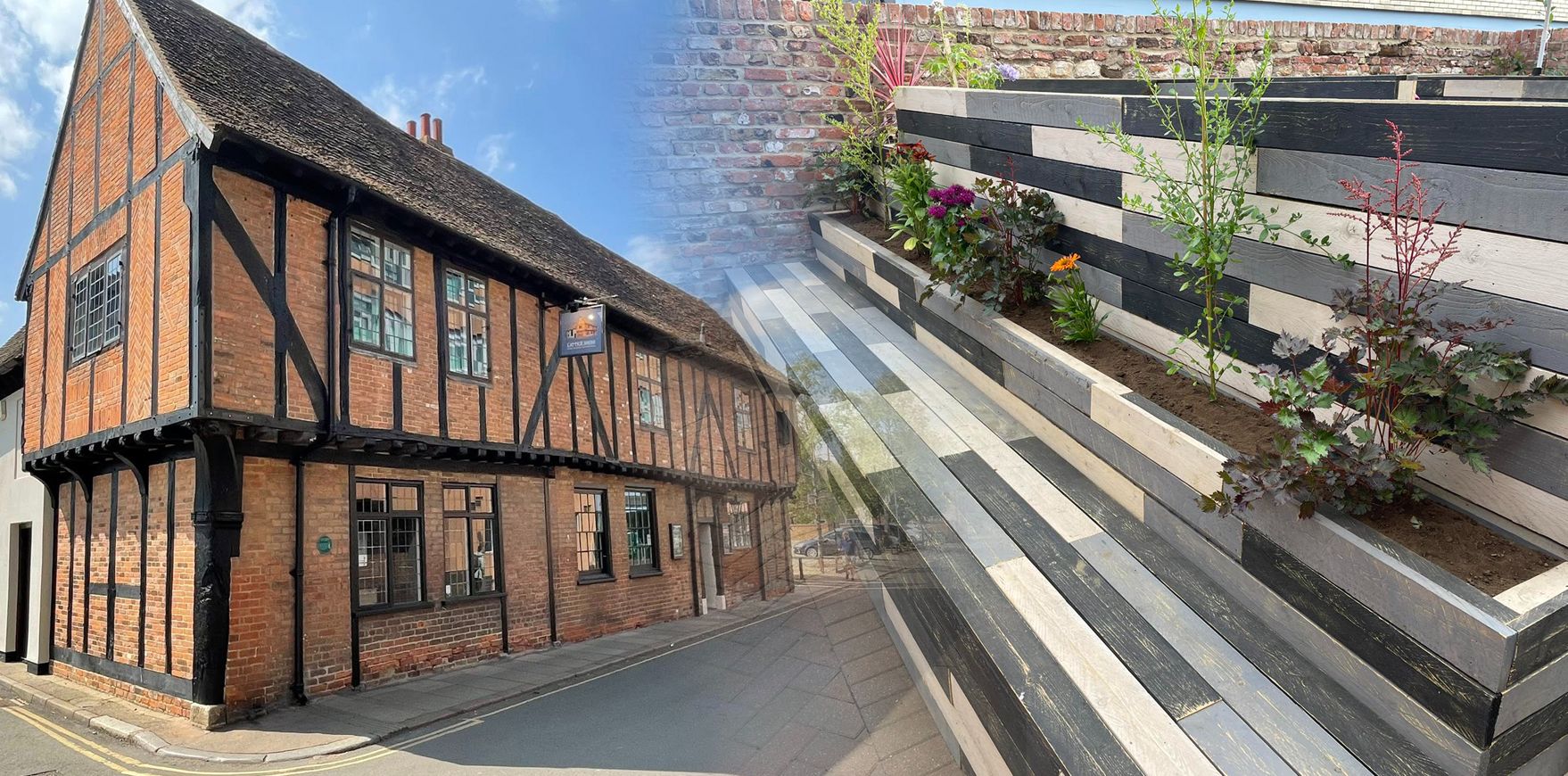 Basque in the summer sunshine in our fully decked beer garden Basque in the summer sunshine in our fully decked beer garden